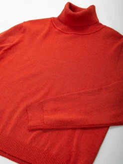 Camisola de malha brilhante com gola alta