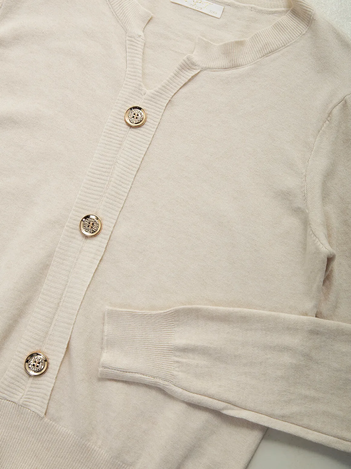 Camisola malha botões decorativos