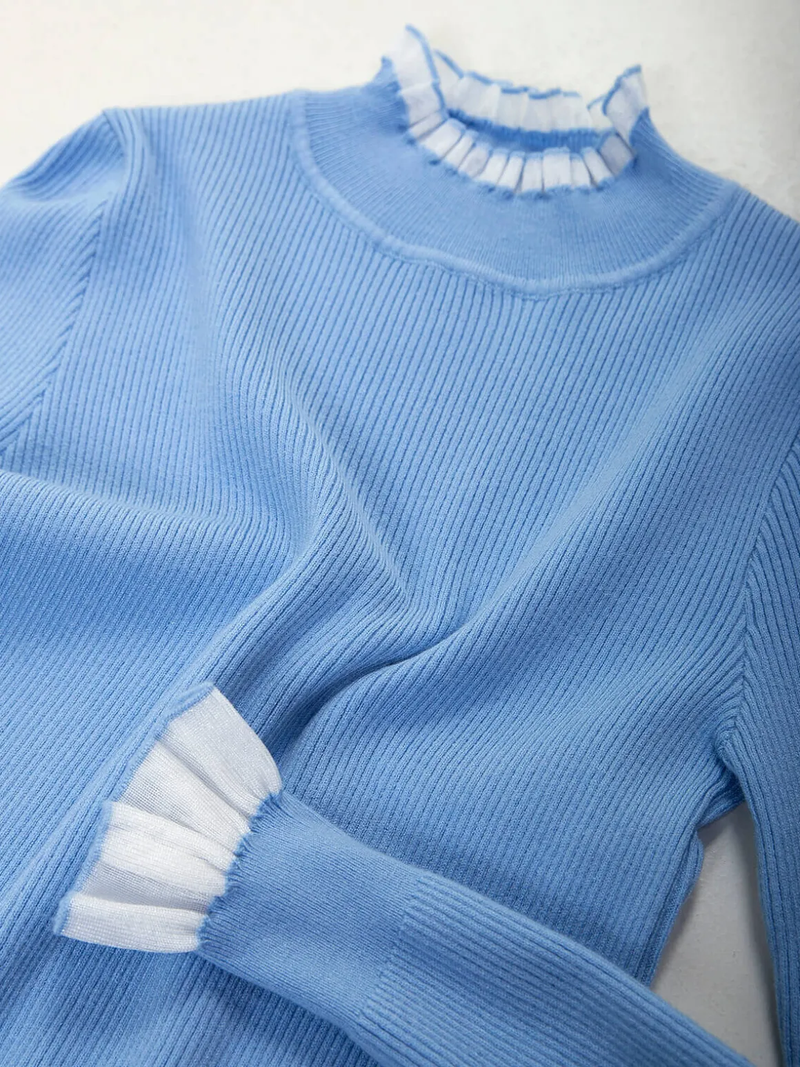 Camisola malha canelada com detalhes