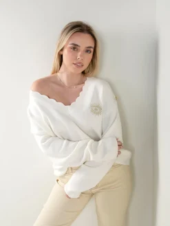 Camisola malha em V com botões dourados