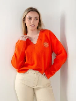 Camisola malha em V com botões dourados