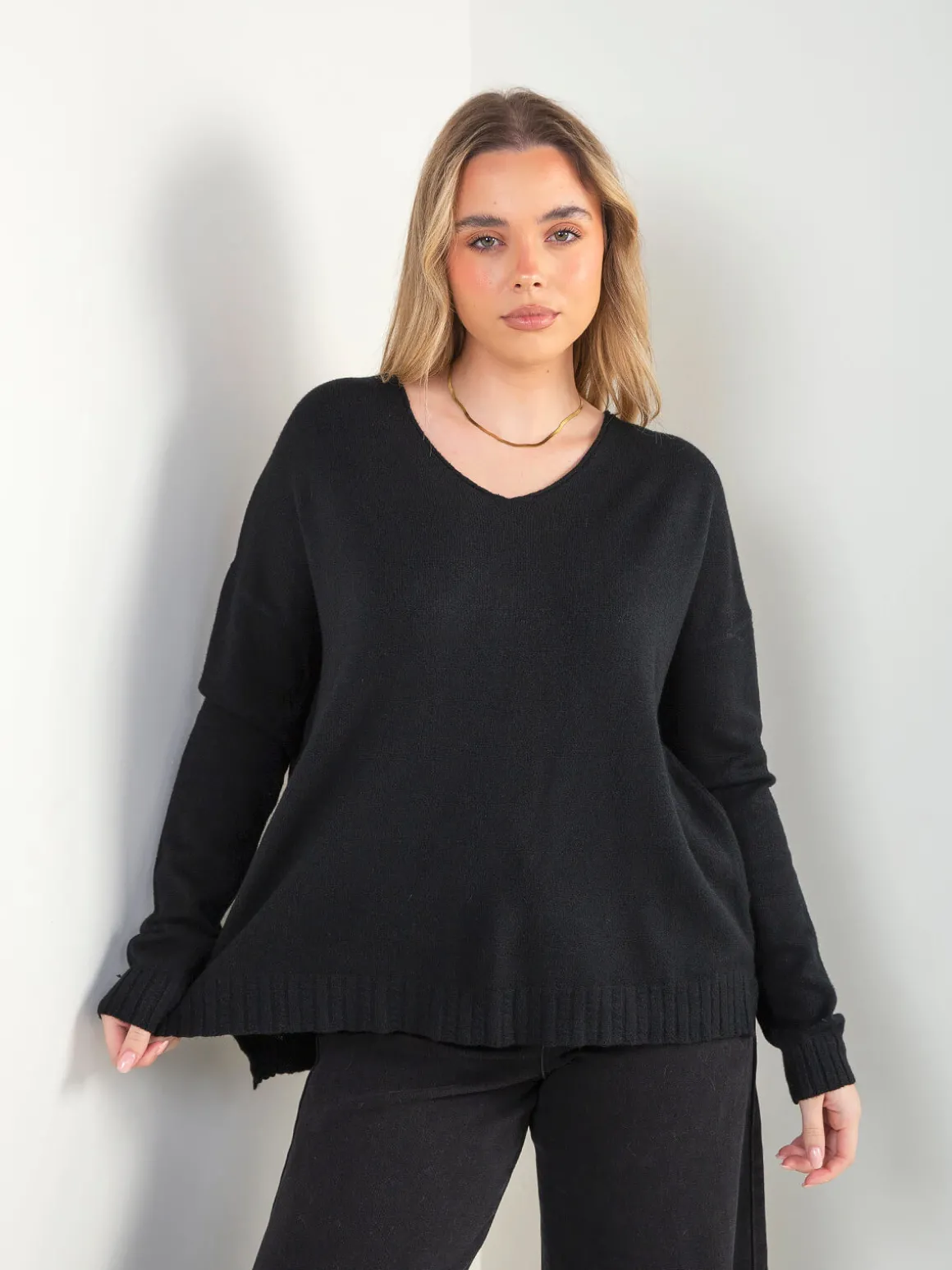 Camisola malha oversized com aberturas