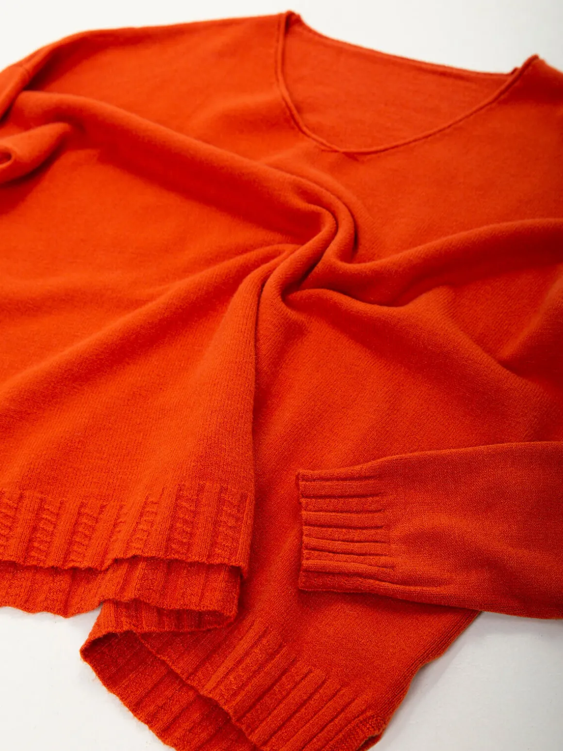 Camisola malha oversized com aberturas