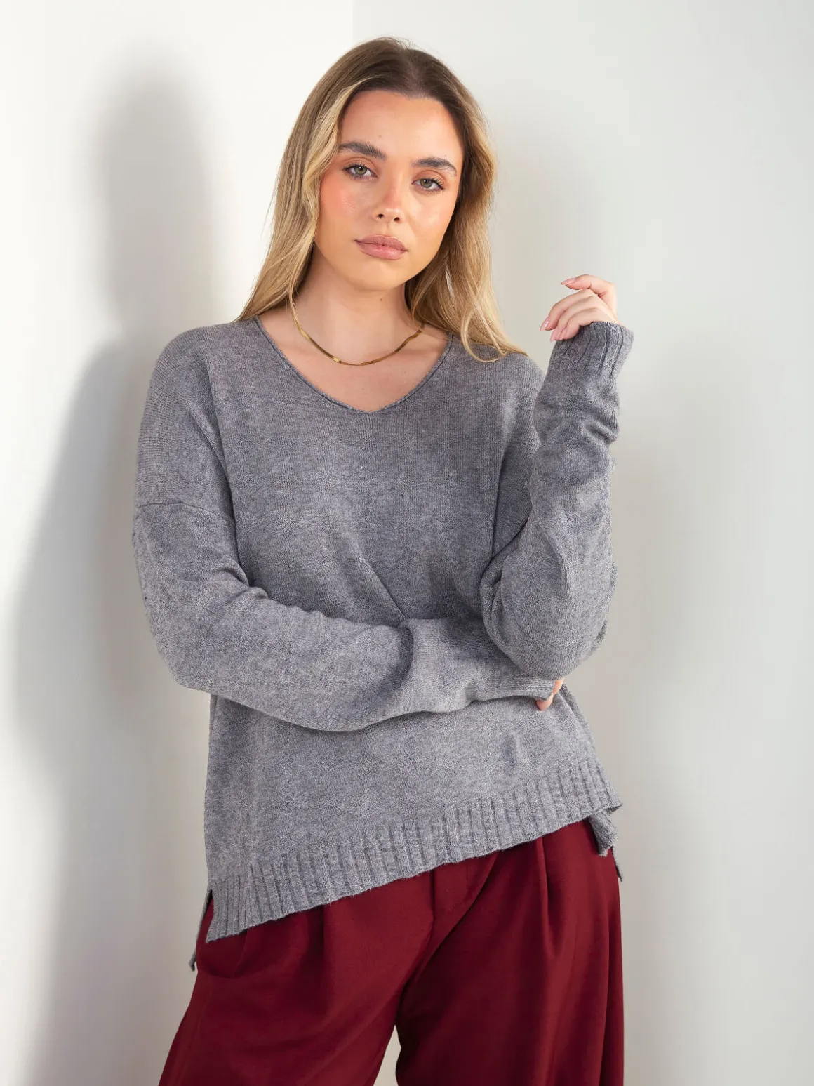 Camisola malha oversized com aberturas