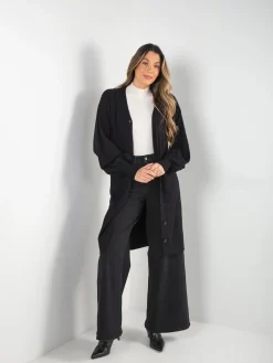 Casaco de malha comprido manga abalonada