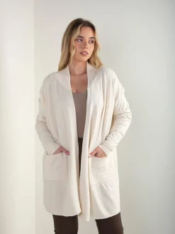 Casaco de malha estruturada com bolsos