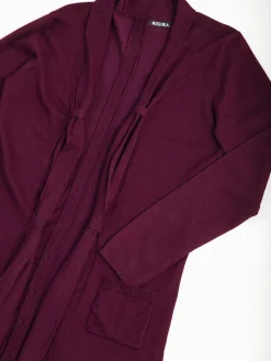 Casaco malha comprido com bolsos