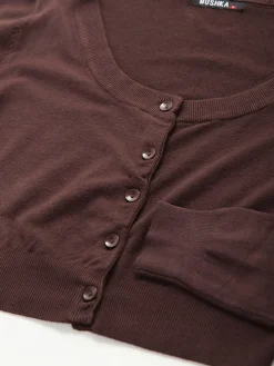 Casaco malha estilo bolero com botões