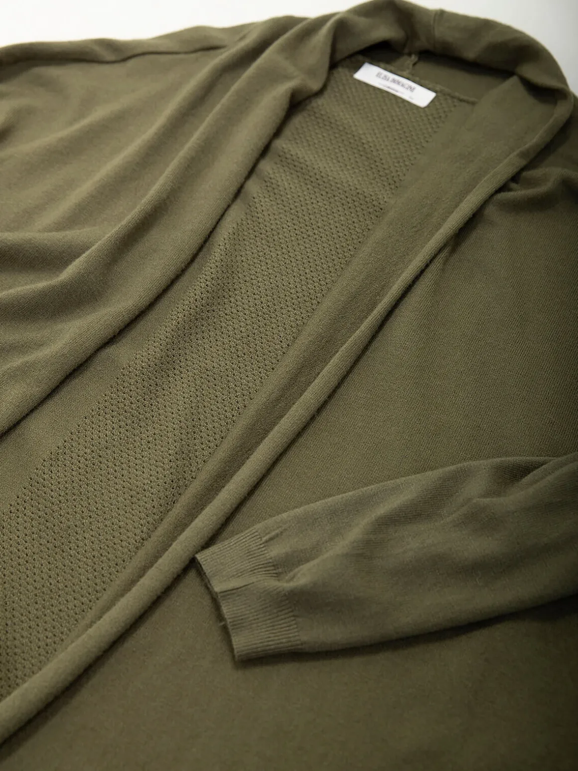 Casaco malha fina aberto com franjas