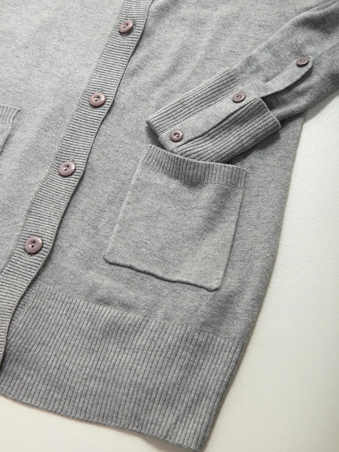 Casaco malha justo com botões