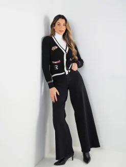 Casaco malha preto com aplicações