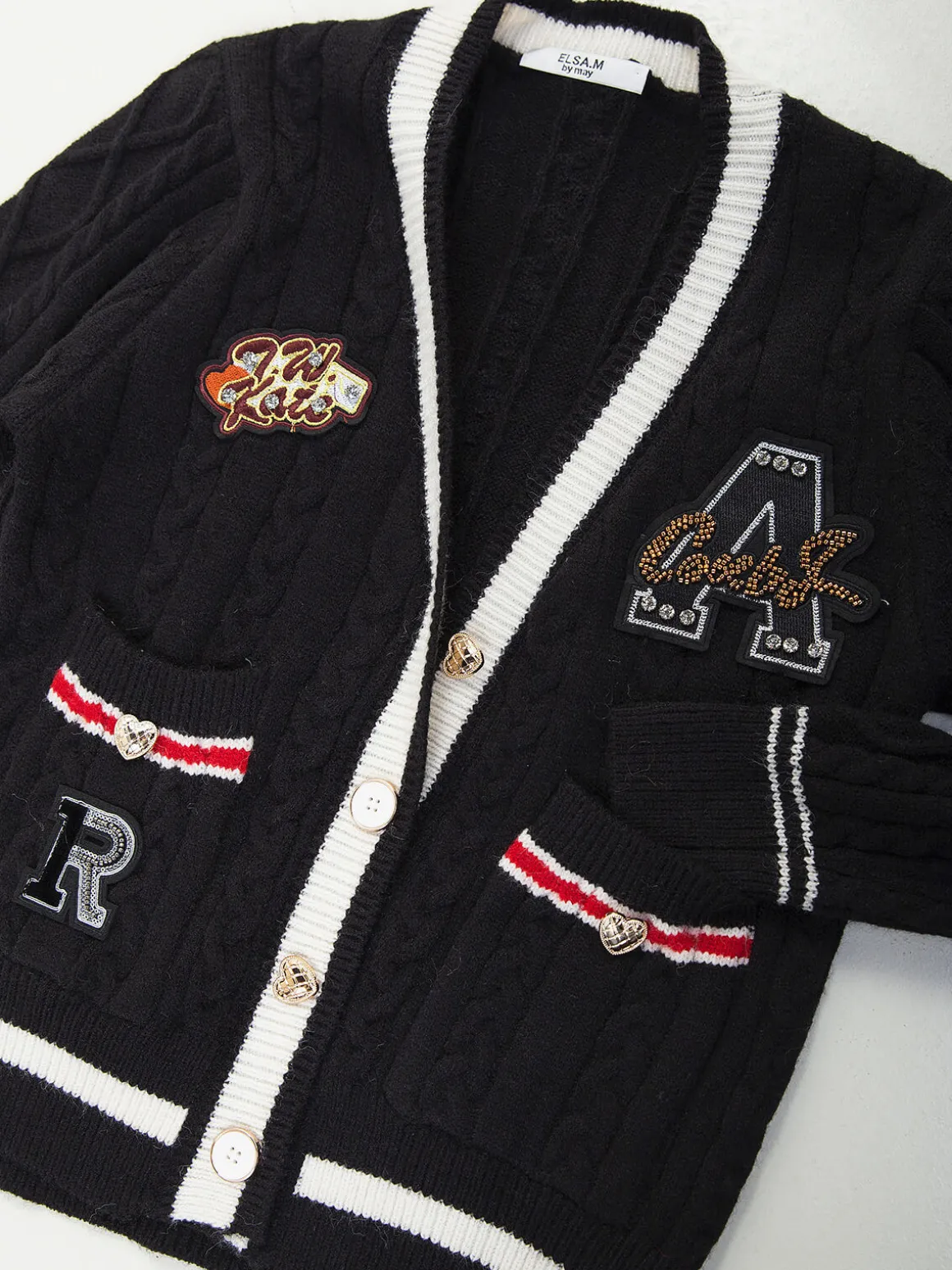 Casaco malha preto com aplicações