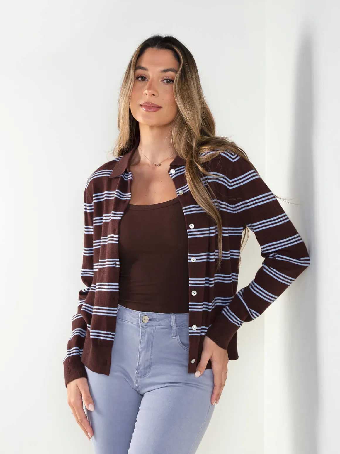 Casaco malha às riscas gola polo