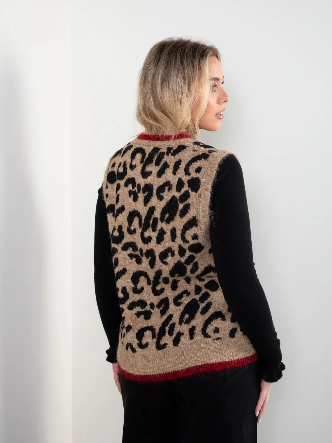 Colete de malha bege com animal print