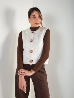 Colete de malha com botões florais