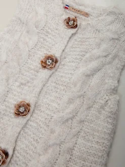 Colete de malha com botões florais