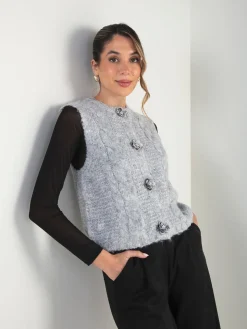 Colete de malha com botões florais