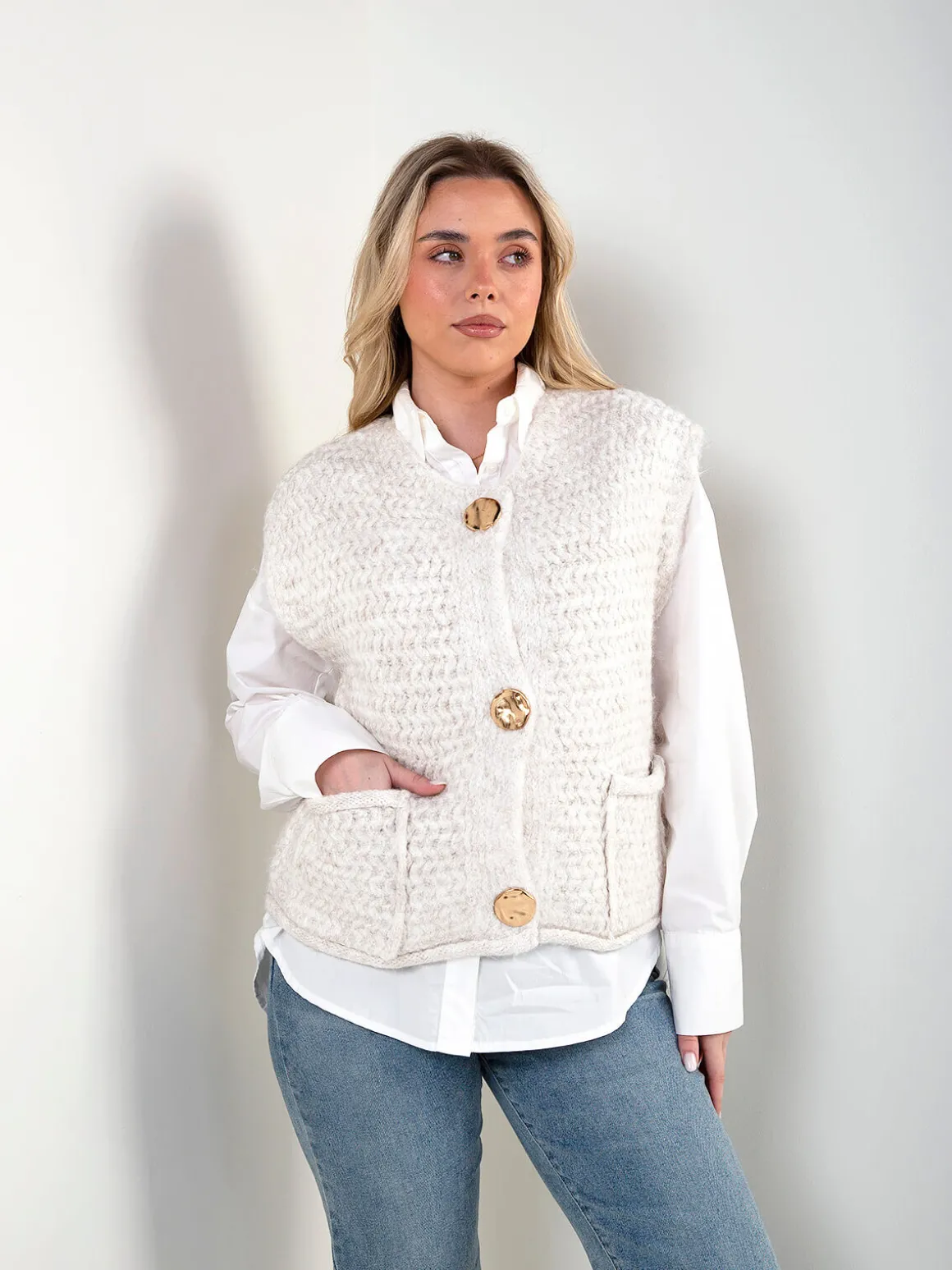 Colete malha com bolsos