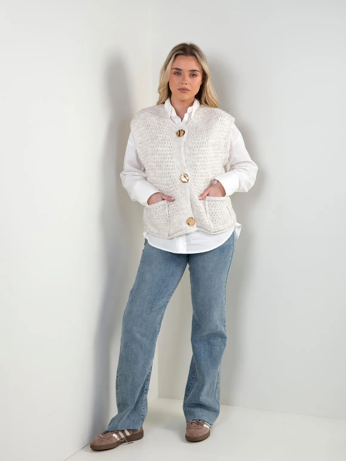 Colete malha com bolsos