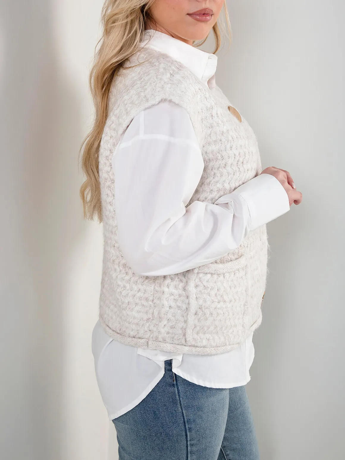 Colete malha com bolsos