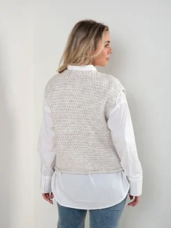 Colete malha com bolsos