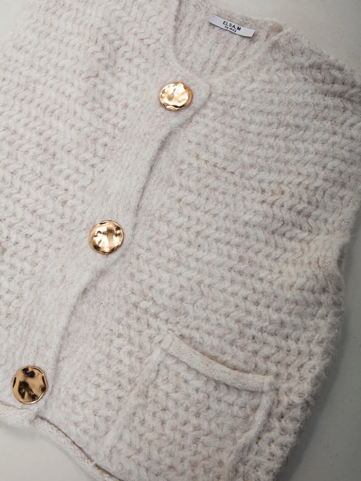 Colete malha com bolsos