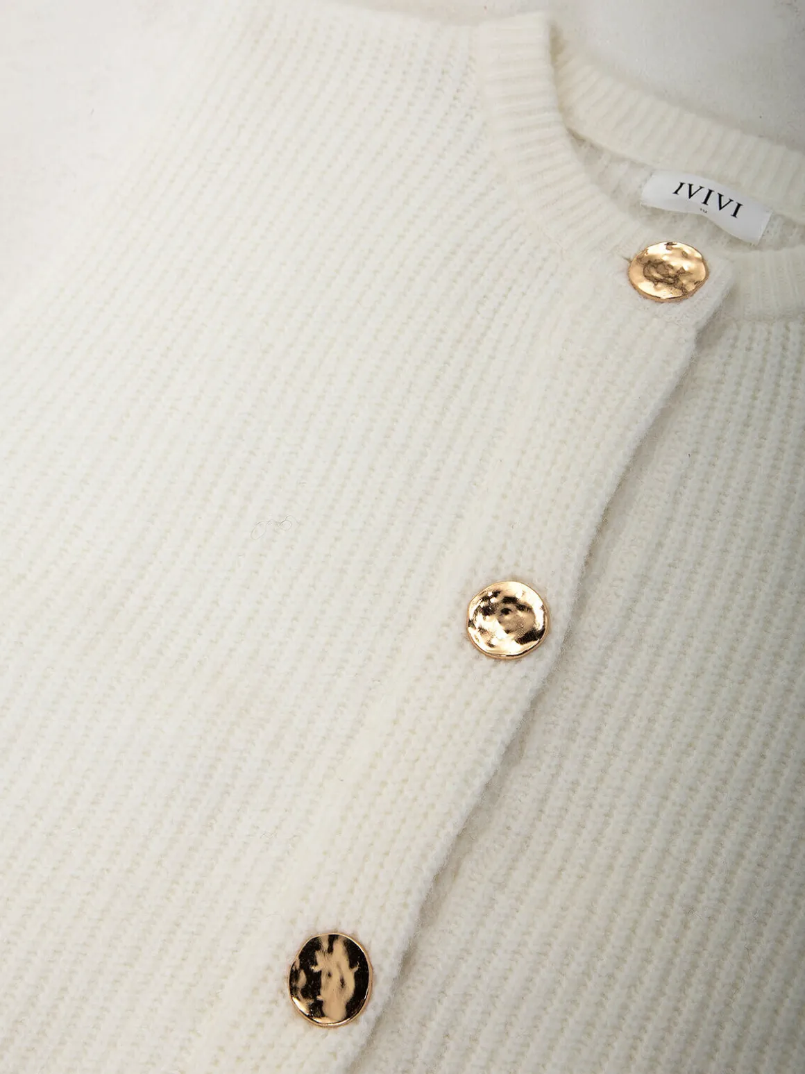 Colete malha pérola com botóes