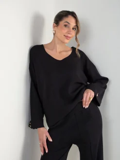 Conjunto malha preto camisola e calças