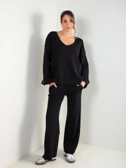 Conjunto malha preto camisola e calças