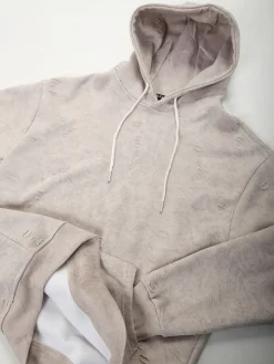 Hoodie com efeito desgastado