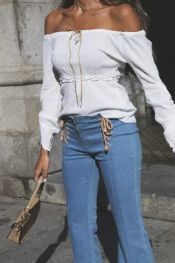 Jeans flare com aberturas