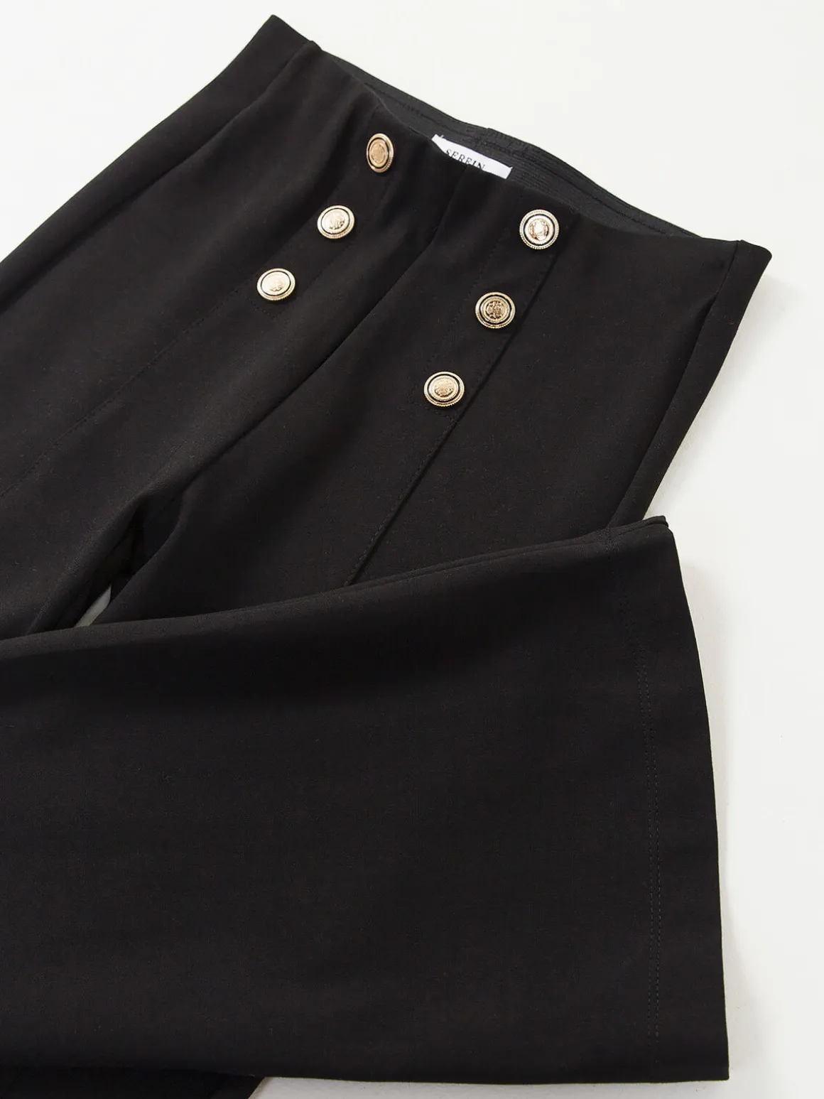 Leggings à boca de sino com botões