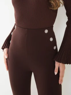 Leggings cintura alta com botões decorativos