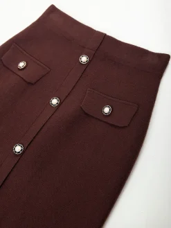 Saia midi malha com botões decorativos