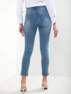 Skinny jeans cintura alta com bordado