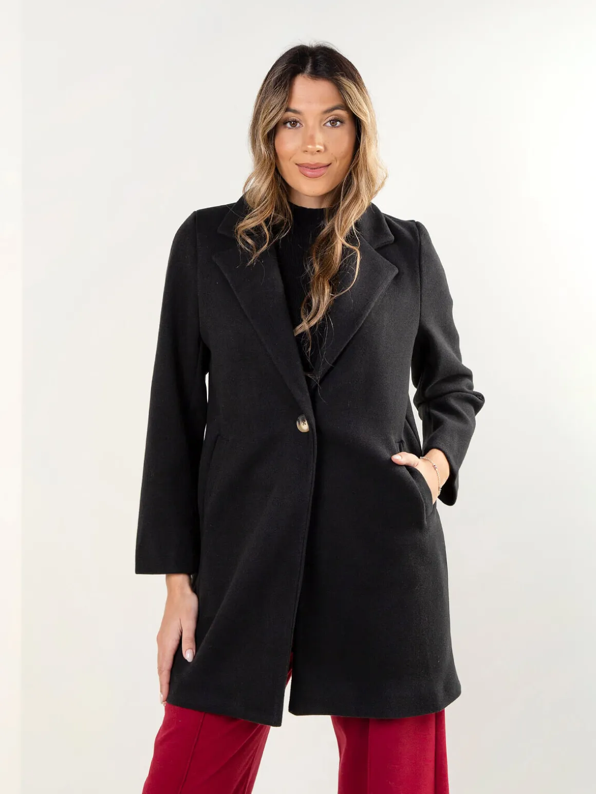 Sobretudo forrado com bolsos