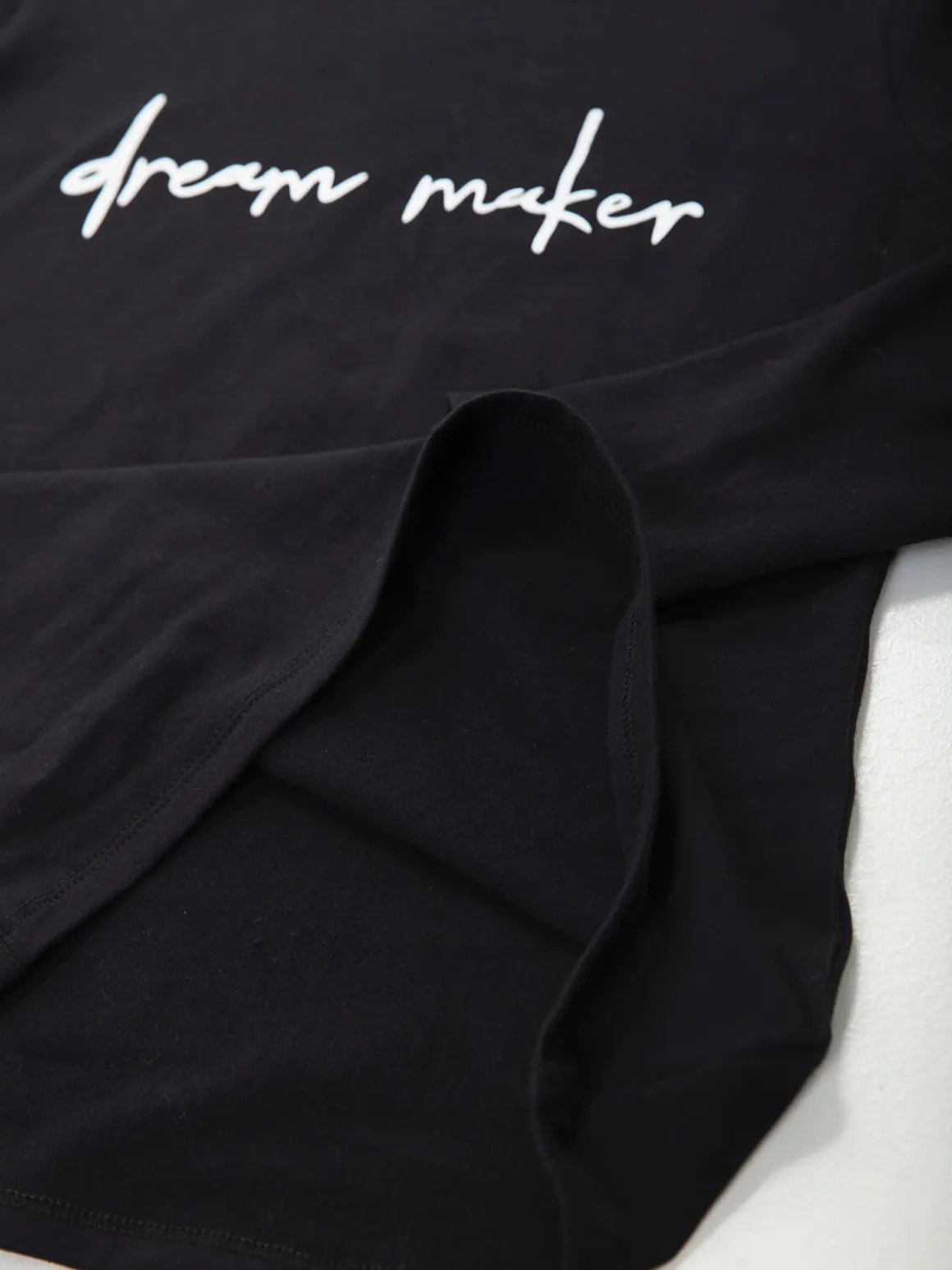 T-shirt manga comprida com mensagem