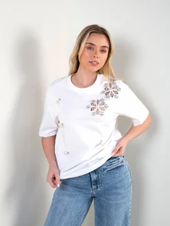 T-shirt manga curta com aplicações